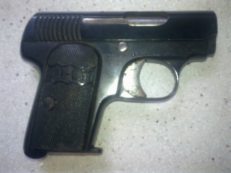 Como dije, esta es una de mis pistolas de las que me gustaría que me ayudáseis a conocer mejor, sobre 01