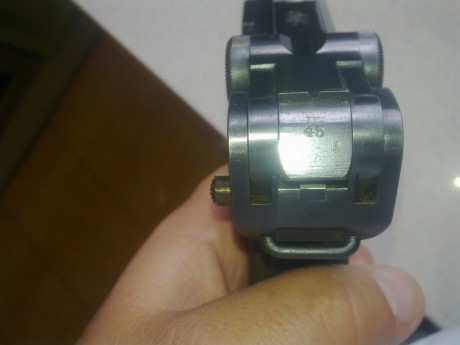 Esta es la Luger de la que quisiera saber año de fabicación (creo que de 1945), y un poco de su identidad, 00