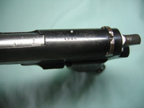 Quisiera confirmar si esta pistola Star es la modelo 1922. descrición:
-Lateral derecho:
No presenta marcaje 30