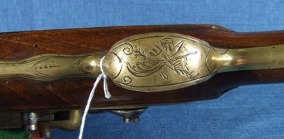 Hola, esta es una pistola europea de cañon de bronce de llave de pedernal y de un calibre como .70, yo 11