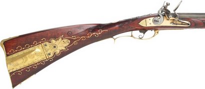 Hola de nuevo, os coloco aqwi unas fotos de unas armas bellamente grabadas. Son unas fotos recogidas por 52