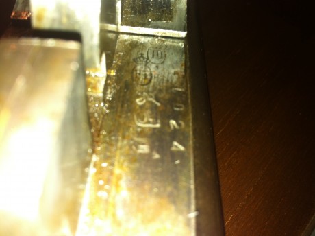 hola que tal , soy de chile y en mi poder tengo una escopeta con las siguientes caracteristicas:
marca: 11