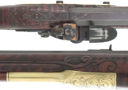 Hola de nuevo, os coloco aqwi unas fotos de unas armas bellamente grabadas. Son unas fotos recogidas por 162