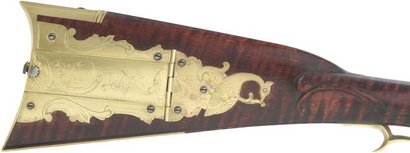 Hola de nuevo, os coloco aqwi unas fotos de unas armas bellamente grabadas. Son unas fotos recogidas por 00