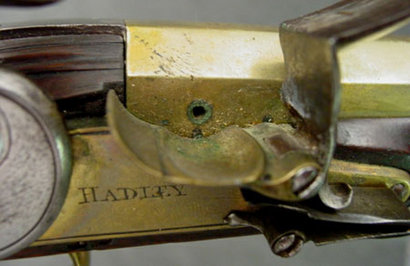 Extremely fine, original flintlock, brass barrel, bell muzzle holster pistol by H. Hadley, London, Circa: 10
