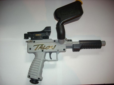 Hola!!!
Pistola-marcadora de paintball marca Brass Eagle modelo Talon 1400, calibre .68

. Funcionamiento 00