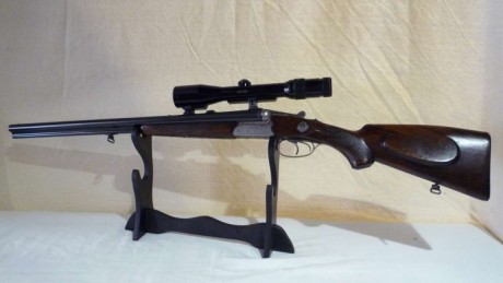 Hola, quisiera saber si alguien conoce este rifle, se trata de un drilling con doble cañon de escopeta 00