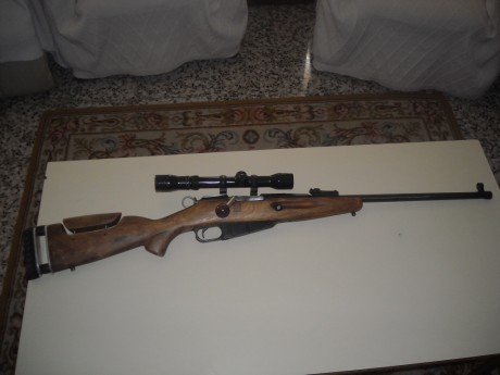 El Mosin-Nagant ..
es un rifle militar accionado por cerrojo, con cargador de cinco proyectiles, que 42