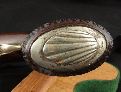 Hola, aqui os pongo unas fotos de una pistola que dice el vendedor (AntiqueGuns.com) que es italiana y 11