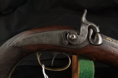 Hola, aqui os pongo unas fotos de una pistola que dice el vendedor (AntiqueGuns.com) que es italiana y 21