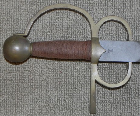 queria que alguien que conociera esta espada me pudiera dar informacion, lo unico que se es que esta fabricada 00