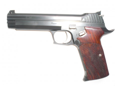 Sin lugar a dudas la pistola 9mm mas precisa de todos los tiempos es la SIG P210. Es imbatible en precisión 61