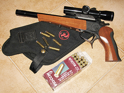 Este Arma es una Thompson Center Contender de 12" con freno de boca incluido en el cañon, modelo 00