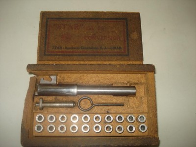 Hola:

He encontrado esta fotografia del convertidor al calibre 22 de los modelos "Star super".

No 140