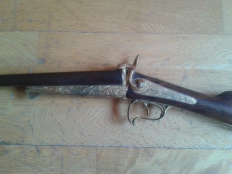 Buenas,

Mi padre me regaló este arma antigua y mi desconocimieno en la materia es total. Alguien me puede 01