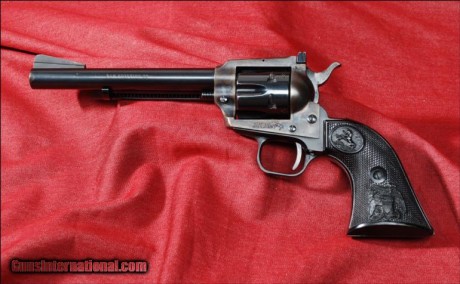  100129392-1-L.jpg Hola, poseo 1 revolver marca COLT mod. New Frontier cal. 22LR. Que lleva marcados en 00