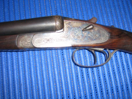 BUENOS DIAS, tengo esta escopeta herencia de mi suegro y la verdad no entiendo mucho de este tipo de armas, 02