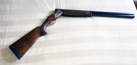Vendo Beretta 686E como recien salida de la armería. He tirado literalmente 2 rondas de tiro al plato. 01