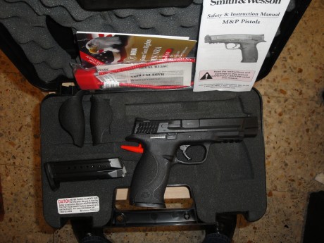Hola, vendo pistola SW MP9-L. calibre 9mm/pb. El arma es nueva, solo ha sido estrenada. 
Se entrega con: 00