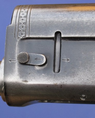 Pues si, la encontré, jajaja.

Después de la escopeta semiautomática inercial Sueca, aunque producida 21