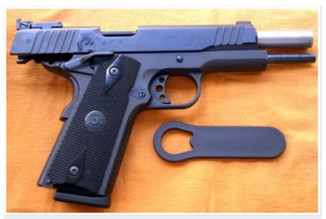 Hola, estoy haciendo algunas pruebas para suavizarle 
el disparador a una 1911 y querria ponerle un muelle 112