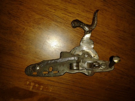 Buenas, mi suego y yo andamos detras de encontrar un muelle que hace la fuerza sobre el perrilo de una 01