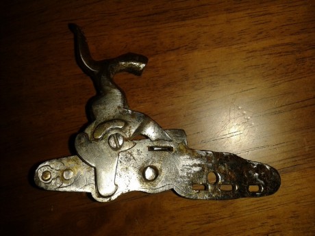 Buenas, mi suego y yo andamos detras de encontrar un muelle que hace la fuerza sobre el perrilo de una 00