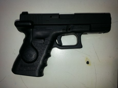 Venta de Glock 19C en perfecto estado, (es la Glock que tiene evacuador en la parte superior para disminuir 01