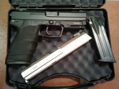 Vendo pistola HK USP calibre 45 acp con corredera negra y otra en inox, ambas con alza regulable de tritio, 00