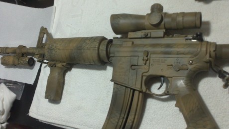 Hola,saco este nuevo tema,pues como yo,muchos de vosotros,amantes de las armas de corte tactico del 22,customizais,vestis,adornais 40