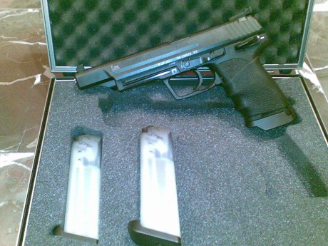 cambio hk elite por otro tipo de pistola ,preferiblemente en 6" , su estado es impecable maletin 02