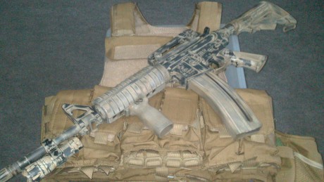 Hola,saco este nuevo tema,pues como yo,muchos de vosotros,amantes de las armas de corte tactico del 22,customizais,vestis,adornais 91