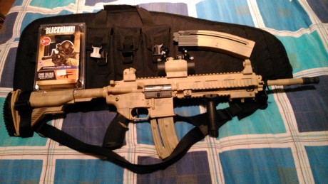 se vende carabina HK 416 D145RS 22 LR pintada con pintura  especial para armas en color tono desertico.
la 01