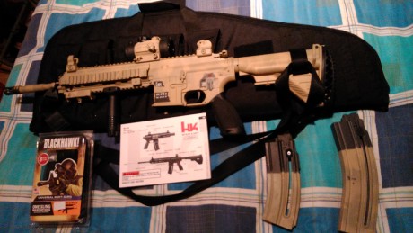 se vende carabina HK 416 D145RS 22 LR pintada con pintura  especial para armas en color tono desertico.
la 00