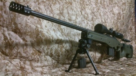 VENDO UN FANTASTICO RIFLE REMINGTON CON CAÑON FLUTEADO DE 26¨ CON FRENO DE BOCA EN CALIBRE 308.ESTA MONTADO 02