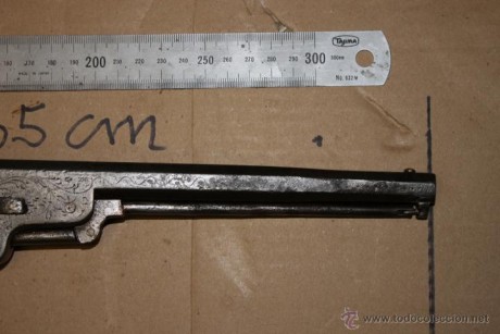 Hola este revolver fue comprado  por un amigo,  es un  COLT NAVY FABRICADO EN BELGICA ( Lieja) en la segunda 30