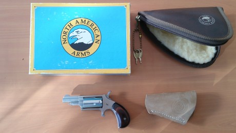 Hola vendo Mini Revólver NORTH AMERICAN ARMS, Cal. 22 MAGNUM. Estado impecable, con su caja y fundas interior 00