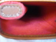 funda de cuero rigido tipo "jamonera"
con marcas por el uso
se utiliza para una superpuesta 01