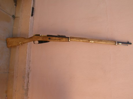 El Mosin-Nagant ..
es un rifle militar accionado por cerrojo, con cargador de cinco proyectiles, que 02