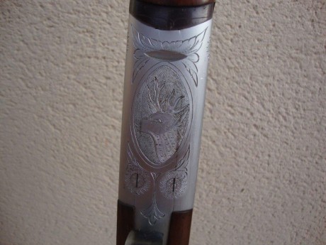 Hola, vendo por 750 eur. o cambio por repetidora benelli o beretta con polichokes en calibre 20 esta escopeta.
 00