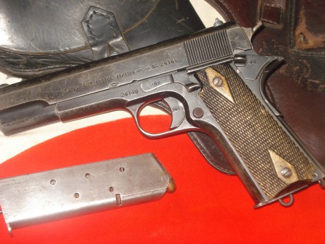 hola cambiaria esta estupenda kongsberg 1914,copia noruega de la colt 1911,fabricada en 1941 inutilizada 00