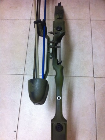 Vendo arco de poleas regulable de 40 a 70lbs marca black bear, Tiene puntos de mira regulables,acople 01