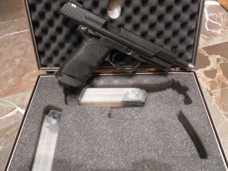 hola , esta pistola hk elite cal 9mm , cañon de 6" tiene una precision sorprendente , solo utilizada 00