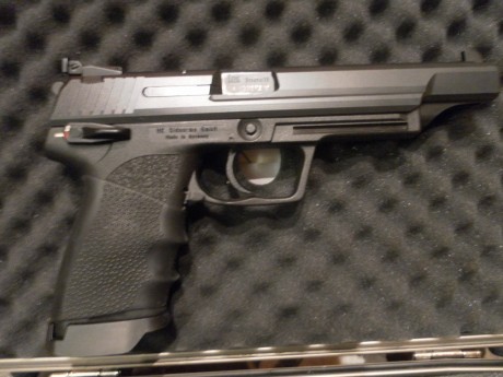 cambio hk elite por otro tipo de pistola ,preferiblemente en 6" , su estado es impecable maletin 01