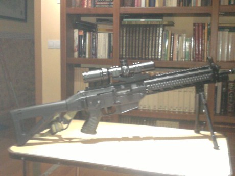 Hola,saco este nuevo tema,pues como yo,muchos de vosotros,amantes de las armas de corte tactico del 22,customizais,vestis,adornais 41