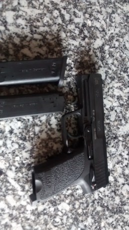 Que tal , cambio pistola  h&K usp en 9 para , la cambiaria por revolver del 44 magnum o 357 , tambien 00
