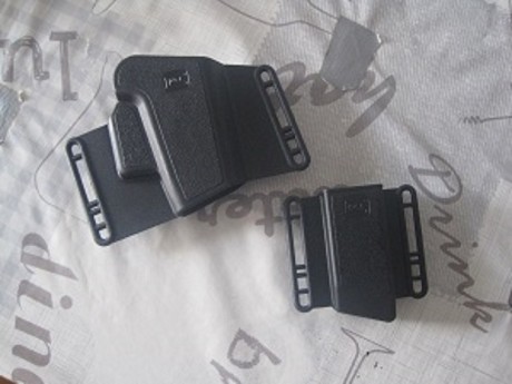 Vendo funda arma y cargador original Glock, para cualquier tipo de arma Glock, delgada y ajustable a diferentes 00