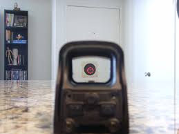 Mi hijo quiere ponerse un punto rojo en un FN semi del 300 magnum, y no tenemos ni idea, 
se quiere gastar 92