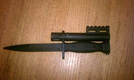 Compro  esta bocacha o similar  para  una  ruger  10/22 .
   Solo   la bocacha. 00