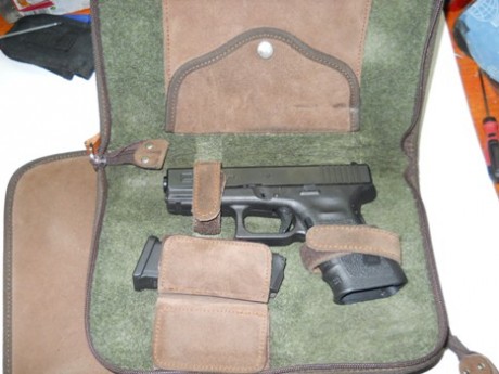 Buenos días.

  Busco en Madrid, Bolsa marca SPS, realizada en ante, para transportar 2 armas cortas, 01